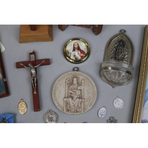 144 - Collection of religious artifacts to include 2 1931 Society of Walsingham badges