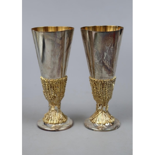 19 - Aurum boxed hallmarked silver and gold pair of Chichester Cathedral Goblets - both approx 16.5cm tal... 
