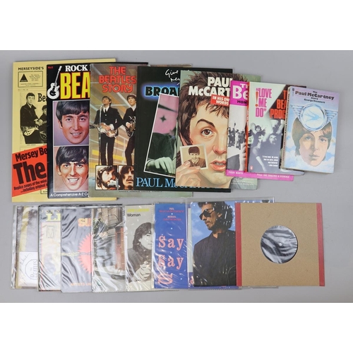 249 - Beatles memorabilia - collection of books together with 7'' singles
