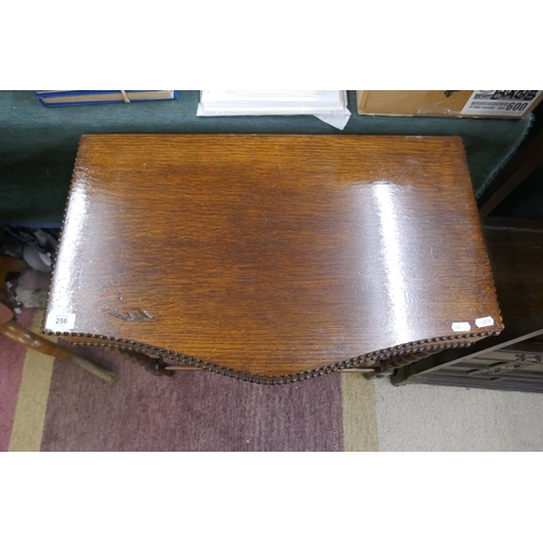 256 - Early 20thC oak cutlery table with barley twist legs and original lining