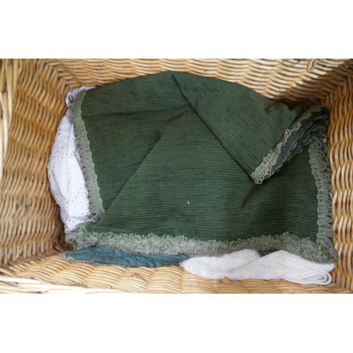 281 - Wicker basket containing linen and lace etc