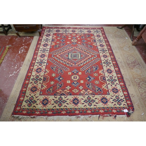 283 - Red patterned rug - Approx 203cm x 145cm