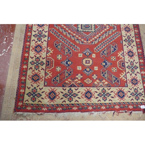 283 - Red patterned rug - Approx 203cm x 145cm