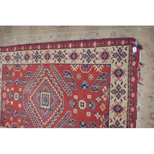 283 - Red patterned rug - Approx 203cm x 145cm