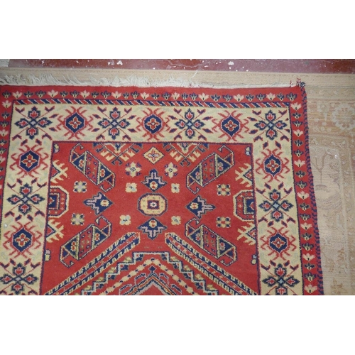 283 - Red patterned rug - Approx 203cm x 145cm