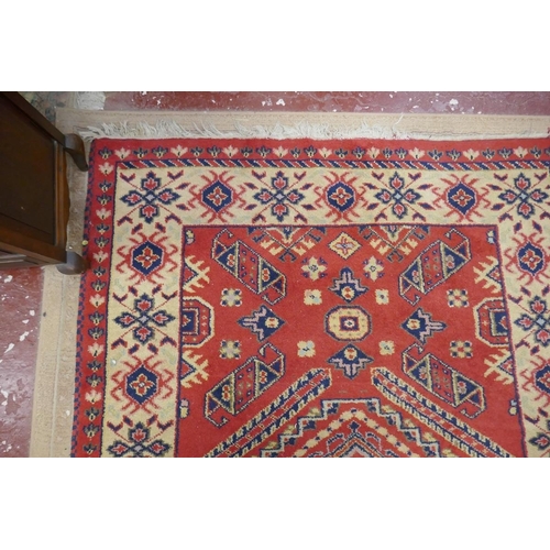 283 - Red patterned rug - Approx 203cm x 145cm