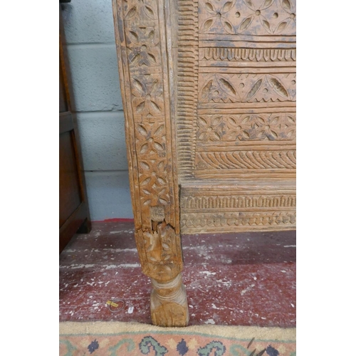 306 - Carved antique Indian dowry chest - Approx size: W: 125cm D: 53cm H: 116cm