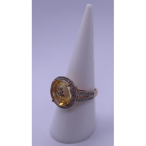 38 - 9ct gold unusual diamond and citrine set ring - Size N