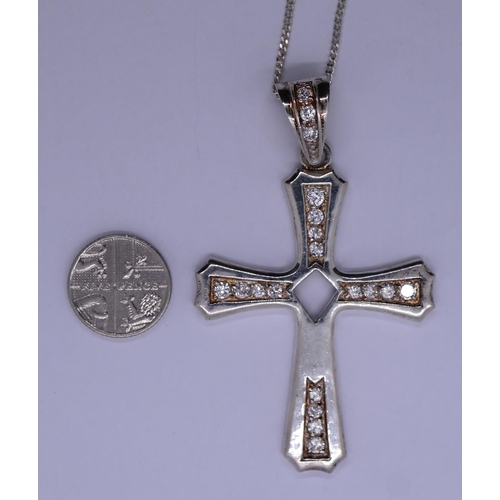 45 - Large silver stone set cross on chain