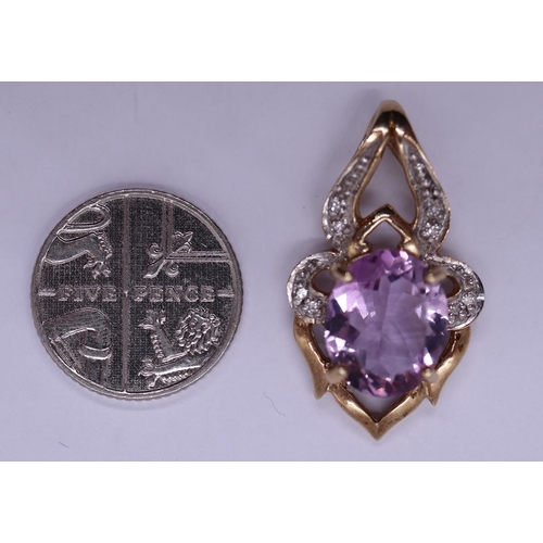 46 - Large 9ct gold amethyst and diamond set pendant