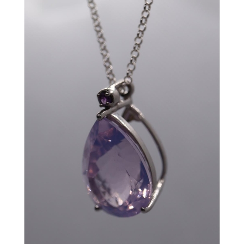 48 - Silver and amethyst pendant on chain