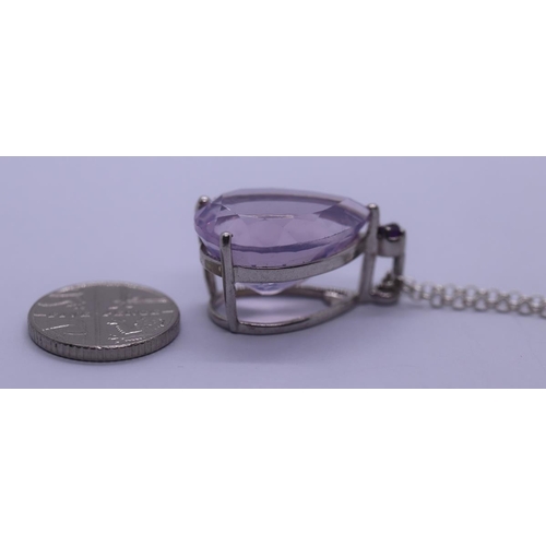 48 - Silver and amethyst pendant on chain
