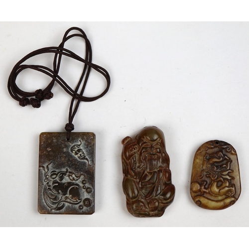 126 - 3 carved Chinese pendants