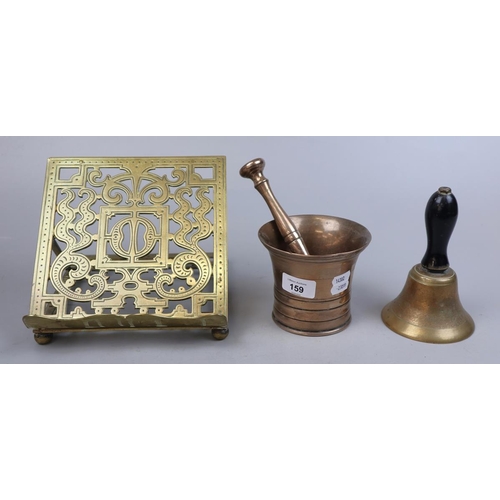 159 - Bronze mortar and pestle together with brass bell and book stand
