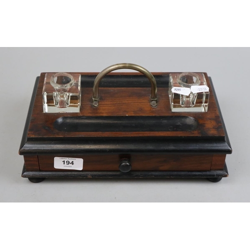 194 - Victorian double inkwell ebonized walnut desk tidy, with drawer