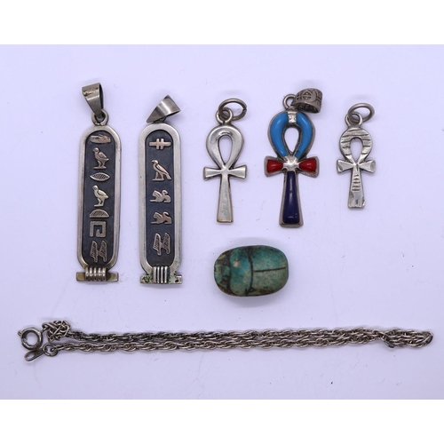 65 - Collection of silver Egyptian pendants and charms