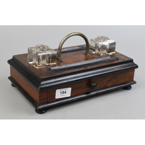 194 - Victorian double inkwell ebonized walnut desk tidy, with drawer