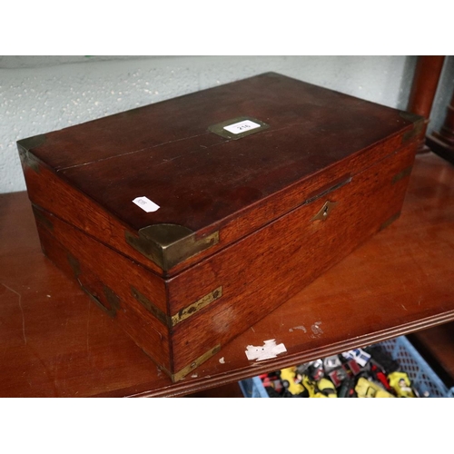 216 - Late Victorian brass bound writing slope with glass inkwells & concealed drawer