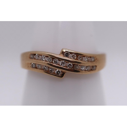 29 - 9ct gold channel set diamond ring - Size M