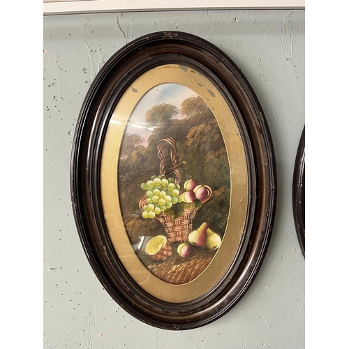 300 - Pair of oil still life in oval frames