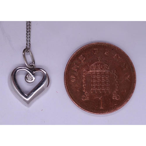 35 - 9ct white gold necklace and heart shaped pendant