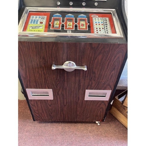 357 - 1960s coin operated fruit machine in working order - Approx H: 138cm  W: 67cm  D: 49cm