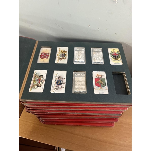 409 - 13 well populated Wills cigarette albums