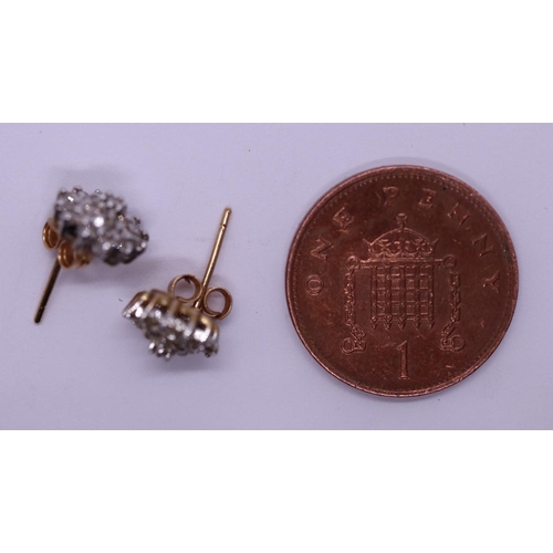 49 - Pair of 9ct gold diamond cluster earrings
