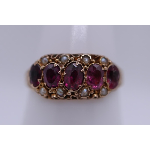64 - 9ct gold Victorian garnet and seed pearl ring - Size M