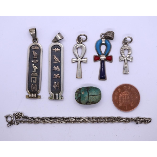 65 - Collection of silver Egyptian pendants and charms