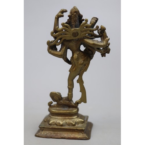 164 - 4 x Eastern Deities in Brass. Nepali Mahakali, Tibetan Avolekitsvara, Shiva and 1 other