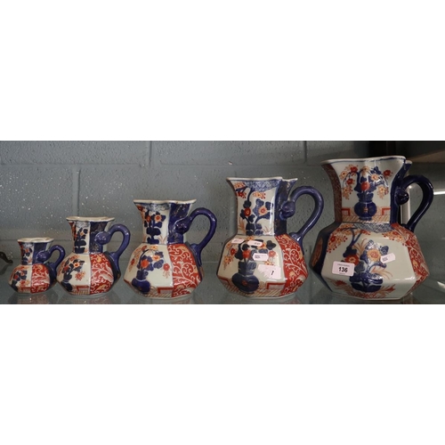 136 - 5 graduated Ironstone jugs - Approx height of tallest: 24cm
