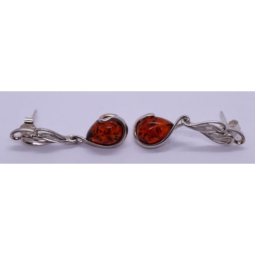 21 - Pair of silver & amber earrings