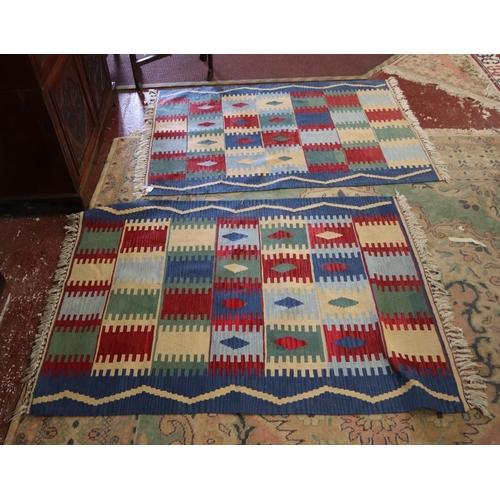 301 - Pair of multi-coloured kilim patterned rugs - Approx size: 172cm x 118cm