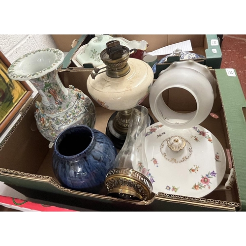 312 - Box of collectables to include vases and an oil lamp