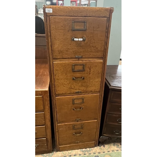 352 - Oak 4 drawer filing cabinet