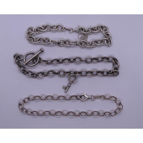 67 - 3 silver chains to include 1 Albert chain