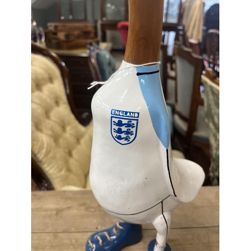 262 - England footballer duck together with Moet duck