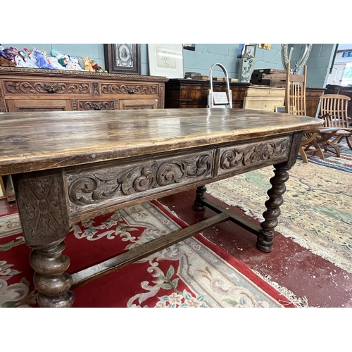 289 - Oak carved table - Approx size: L: 183cm W: 75cm H: 76cm