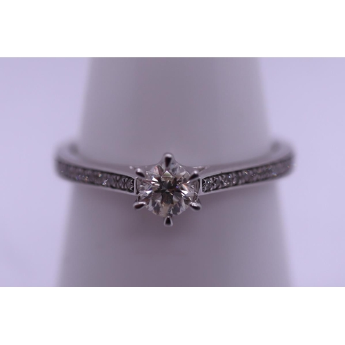 33 - 9ct white gold diamond solitaire ring - Size O