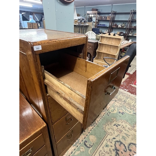 352 - Oak 4 drawer filing cabinet