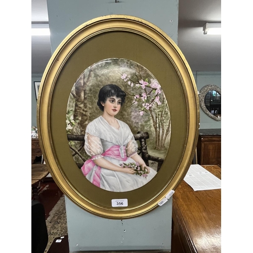 356 - 2 gilt framed portraits on porcelain of women