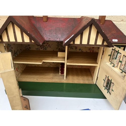 387 - Large Tri-Ang dolls house with furniture