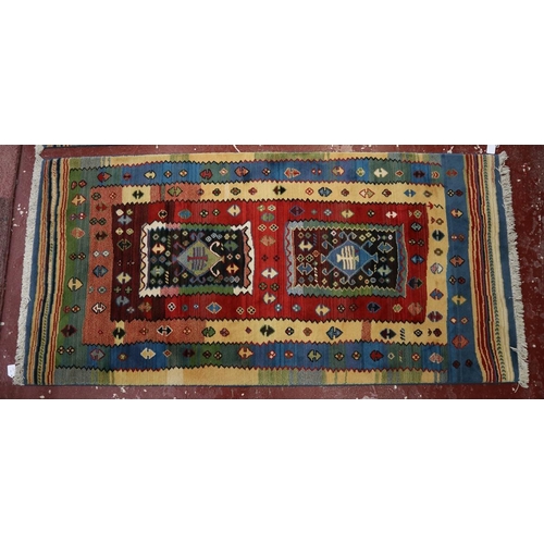 407 - Pair of multi-coloured patterned rugs - Approx size: 191cm x 91cm