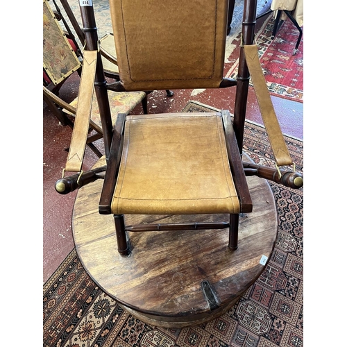 414 - Unusual bamboo effect leather and brass folding chair