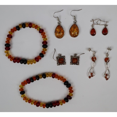 80 - 4 pairs of silver and amber earrings, 2 baltic amber bead bracelets, and boxed golden topaz silver r... 