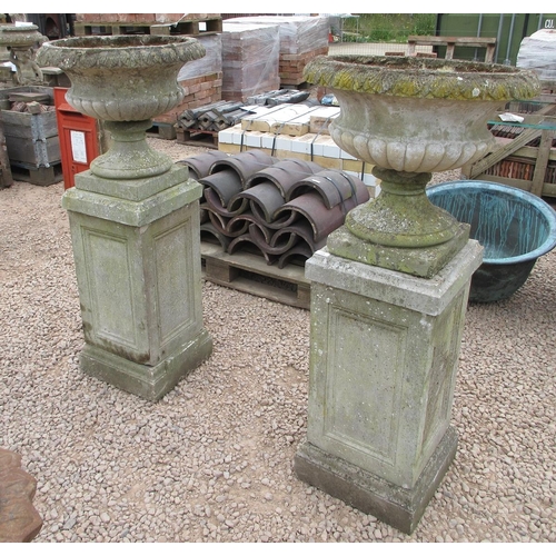 125 - Pair of antique reconstituted stone campagna urns on plinths - Approx Height: 127cm Diameter: 56cm