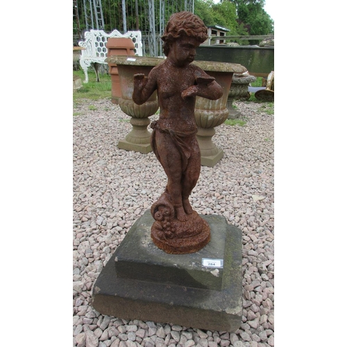 284 - Small cast iron figure with butterfly on stone base