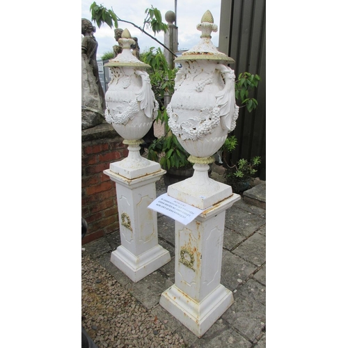 348 - Pair of cast iron Victorian lidded earns on square base pedestals - Approx Height: 175cm
