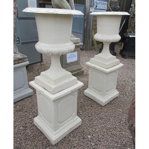 364 - Pair of cast-iron painted urns on painted stone plinths - Approx Height: 146cm